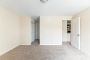 Oaks of Woodlawn apartments bedroom hallway with open door