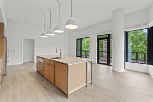Quartermill Apartments living space with pillar