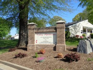 Wesley Apartments sign