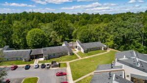 Wesley Apartments parking and forest