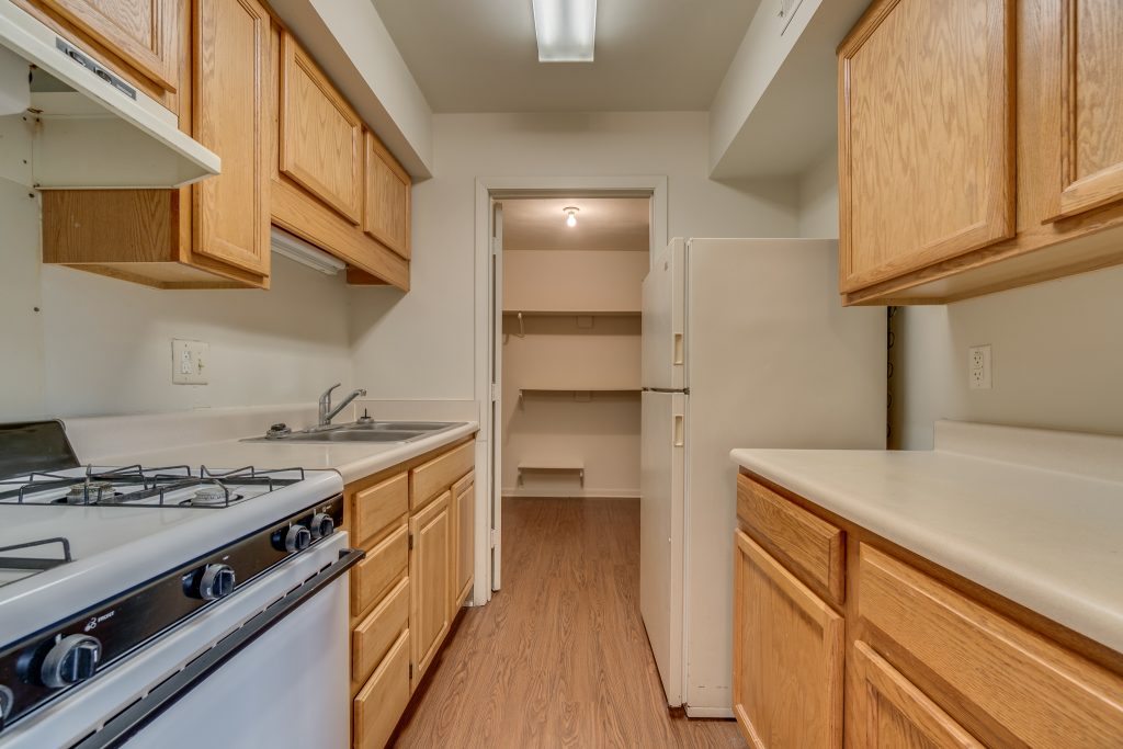 Wesley Apartments kitchen with pantry