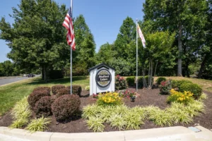 Stafford Lakes Sign with flags